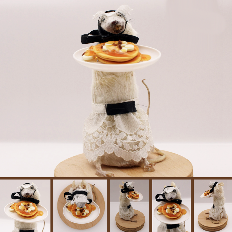 Mouse maid with sweet stack of pancakes